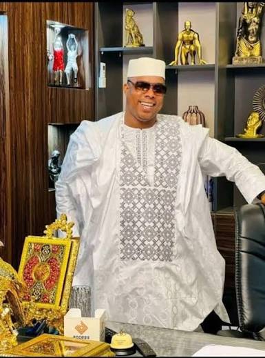 Fassally Tarawally in traditional white attire